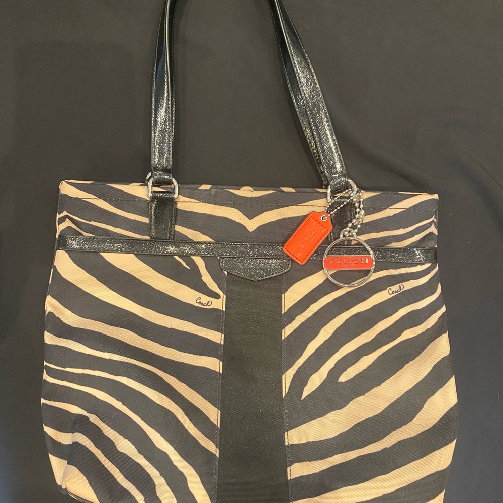 Coach Black and Tan Tote Bag with Structured Design